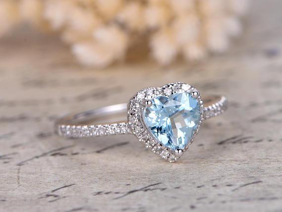 Solitaire Knife Edge Heart Shaped Moissanite Engagement Ring In 950  Platinum | Fascinating Diamonds
